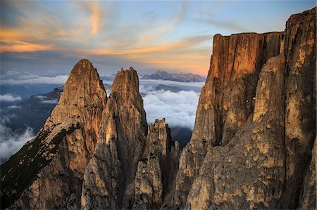 Aerial view of Santner peak at sunset. Sciliar Natural Park. Plateau of Siusi Alp. Dolomites. Trentino Alto Adige. Italy Europe Foto de stock - Con derechos protegidos, Código: 879-09034096