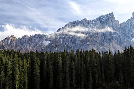 simsearch:879-09034277,k - Latemar group seen from Lake Carezza. Fiemme Dolomites South Tyrol Trentino Alto Adige Italy Stock Photo - Rights-Managed, Code: 879-09034102