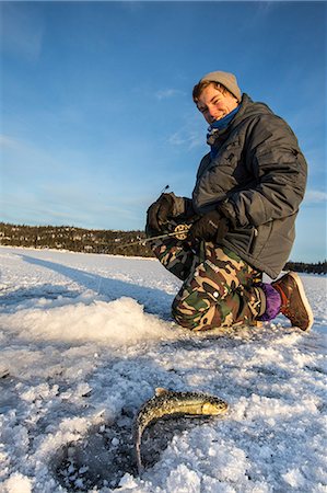 pêche dans la glace - Ice fishing at Limingen Lake Rorvik Børgefjell National Park Trøndelag Norway Europe Photographie de stock - Rights-Managed, Code: 879-09034129