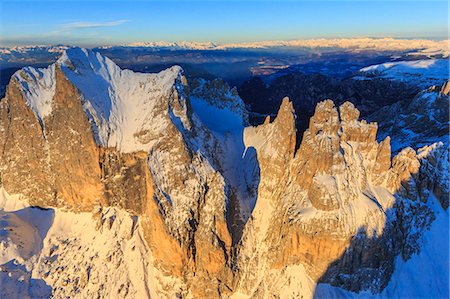 Aerial view of Catinaccio Group and Vajolet Towers at sunset. Sciliar Natural Park Dolomites Trentino Alto Adige Italy Europe Photographie de stock - Rights-Managed, Code: 879-09034121