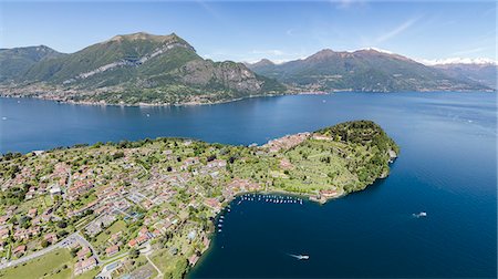 Aerial view of the village of Bellagio frames by the blue Lake Como and snowy peaks in background Lombardy Italy Europe Photographie de stock - Rights-Managed, Code: 879-09034192