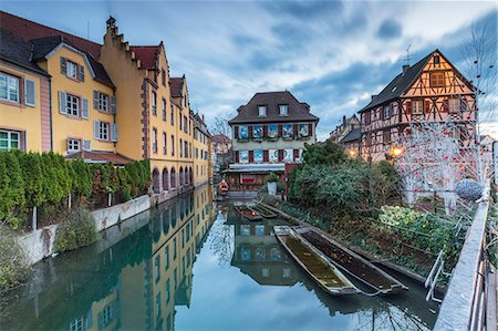 france at christmas time pictures - Dusk lights on houses reflected in river Lauch at Christmas Petite Venise Colmar Haut-Rhin department Alsace France Europe Photographie de stock - Rights-Managed, Code: 879-09034269