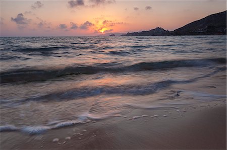 simsearch:879-09100061,k - The last lights of the sunset are reflected on sea waves and sandy beach Licata province of Agrigento Sicily Italy Europe Foto de stock - Con derechos protegidos, Código: 879-09034320