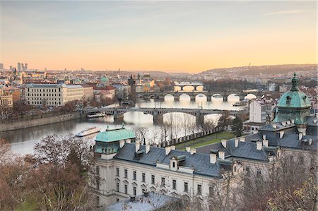 simsearch:862-08699008,k - Sunset on the historical bridges and buildings reflected on Vltava (Moldava) river Prague Czech Republic Europe Stock Photo - Rights-Managed, Code: 879-09034333