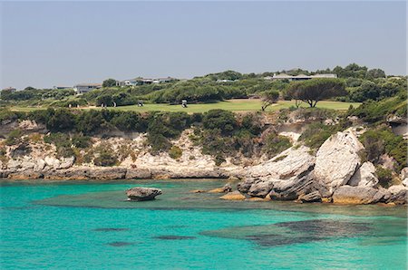 Summer view of the turquoise sea and the golf course on the promontory Sperone Bonifacio South Corsica France Europe Fotografie stock - Rights-Managed, Codice: 879-09034382