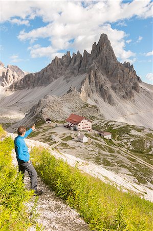 simsearch:879-09043852,k - Hicker admire the Paterno Mount and Locatelli refuge. Sesto Dolomites, Trentino Alto Adige, Italy, Europe Foto de stock - Con derechos protegidos, Código: 879-09032785