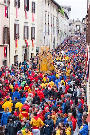 Europe,Italy,Umbria,Perugia district,Gubbio. The crowd and the Race of the Candles Stock Photo - Rights-Managed, Code: 879-09032885