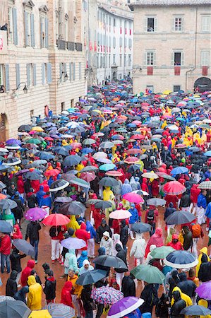 Europe,Italy,Umbria,Perugia district,Gubbio. The crowd and the Race of the Candles Stock Photo - Rights-Managed, Code: 879-09032902