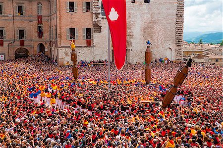 Europe,Italy,Umbria,Perugia district,Gubbio. The crowd and the Race of the Candles Stock Photo - Rights-Managed, Code: 879-09032937