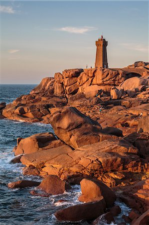 pink granite coast - Ploumanach lighthouse at sunset. Perros-Guirec, Côtes-d'Armor, Brittany, France. Stock Photo - Rights-Managed, Code: 879-09033304