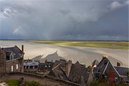 simsearch:879-09033308,k - Mont Saint Michel, Normandy, France. A view of bay with rainbow and abbey's shadow Photographie de stock - Rights-Managed, Code: 879-09033395