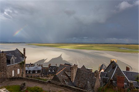 simsearch:879-09033313,k - Mont Saint Michel, Normandy, France. A view of bay with rainbow and abbey's shadow Foto de stock - Direito Controlado, Número: 879-09033395