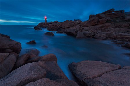 simsearch:879-09190989,k - Mean Ruz lighthouse, Brittany, France. The Ploumanach's lighthouse one hour after sunset during the rising tide Stock Photo - Rights-Managed, Code: 879-09033425