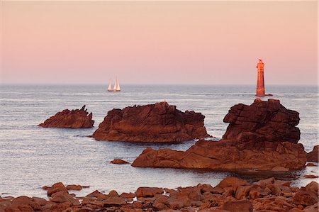 The Jument lighthouse at sunrise, off the island of Ouessant, France. Stock Photo - Rights-Managed, Code: 879-09033426