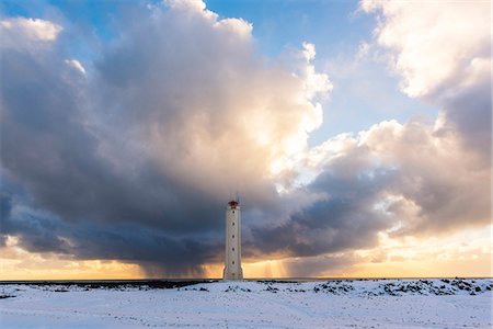 faro - Snaefellsnes Peninsula, Western Iceland, Iceland. Malariff lighthouse in winter. Foto de stock - Con derechos protegidos, Código: 879-09033511