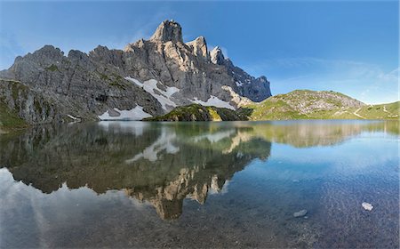 simsearch:879-09033045,k - Europe, Italy, Veneto, Belluno. The towers of mount Civetta reflected in the Lake Coldai on a clear summer morning, Civetta group, Dolomites Photographie de stock - Rights-Managed, Code: 879-09033578