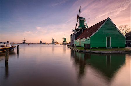 Wind mills at dawn, Zaanse Schans, Nederalnds. Stock Photo - Rights-Managed, Code: 879-09033769