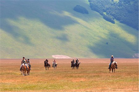 simsearch:6129-09057574,k - Europe,Italy,Umbria,Perugia district,Castelluccio of Norcia. Horse riding Stock Photo - Rights-Managed, Code: 879-09043222