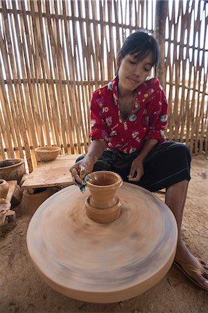 Samka, Shan State, Myanmar. Woman working on a pottery village. Stock Photo - Rights-Managed, Code: 879-09043634