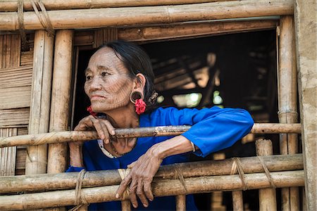 Rakhine state, Myanmar. Chin woman with traditional tattooed face. Foto de stock - Con derechos protegidos, Código: 879-09043642