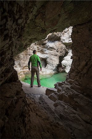 simsearch:879-09043654,k - Dolomites, Belluno, Veneto, Italy. Man exploring the gorge of the Soffia waterfall, Mis valley Stock Photo - Rights-Managed, Code: 879-09043659