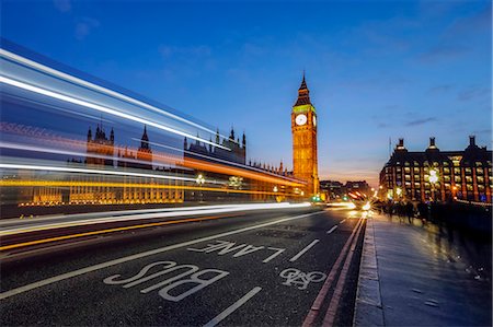 Doubledeckerbus runs towards Big Ben also called Elizabeth Tower, located north end of the Palace of Westminster in London United Kingdom Europe Stock Photo - Rights-Managed, Code: 879-09043818