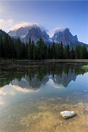 Cadini di Misurina group is reflected in Lake Antorno. Auronzo of Cadore Veneto Sesto Dolomites Italy Europe Photographie de stock - Rights-Managed, Code: 879-09043860