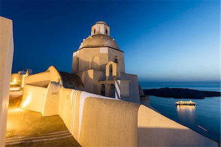 Lights of the church and of a cruise ship as a contrast with blue of Aegean Sea Firostefani Santorini Cyclades Greece Europe Photographie de stock - Rights-Managed, Code: 879-09043890