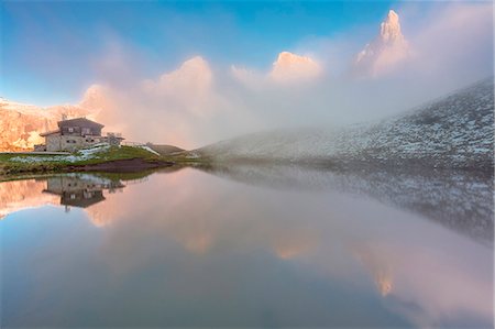 simsearch:879-09099935,k - Dolomites Alps, Pale di San Martino reflecting on water with clouds, Baita Segantini, Trentino Alto Adige District, Italy Stock Photo - Rights-Managed, Code: 879-09099934