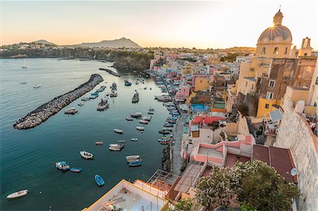 Italy, Campania, Province of Naples, Procida. Sunset at Marina di Corricella Photographie de stock - Rights-Managed, Code: 879-09100318