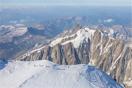simsearch:879-09100340,k - Mountaneers on the summit of Mont Blanc. Courmayer, Aosta valley, Italy Stock Photo - Rights-Managed, Code: 879-09100339