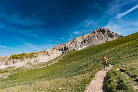 Trekker walking towards Gran Sasso, Campo Imperatore, L'Aquila province, Abruzzo, Italy, Europe Photographie de stock - Rights-Managed, Code: 879-09100421