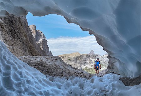 simsearch:879-09101067,k - Italy, South Tyrol, Hocpustertal, Sexten. Snow cave in the summer season along the Alpinisteig / Strada degli alpini via ferrata, Sexten Dolomites Foto de stock - Con derechos protegidos, Código: 879-09100474