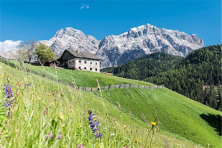 simsearch:879-09100184,k - La Valle / Wengen, Alta Badia, Bolzano province, South Tyrol, Italy. Old farm before the peaks of Cima Nove / Neunerspitze and Cima Dieci / Zehnerspitze. Stock Photo - Rights-Managed, Code: 879-09100577