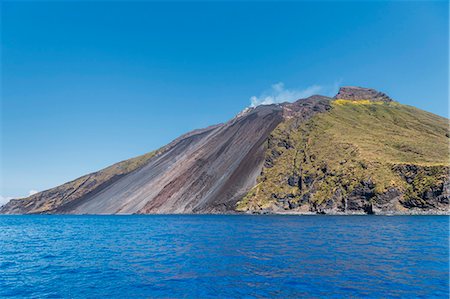 Stromboli, Messina district, Sicily, Italy, Europe. The sciara del fuoco (stream of fire) of volcanic island Stromboli Stock Photo - Rights-Managed, Code: 879-09100625