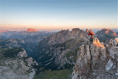 simsearch:6129-09086922,k - Sesto / Sexten, province of Bolzano, Dolomites, South Tyrol, Italy. A photographer photographed the sunrise at the Three Peaks of Lavaredo Photographie de stock - Rights-Managed, Code: 879-09100641