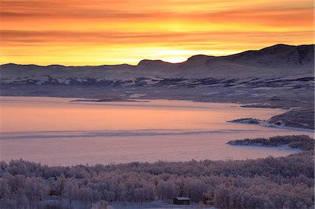 simsearch:879-09021261,k - Sunrise on the snowy landscape, Bjorkliden, Abisko, Kiruna Municipality, Norrbotten County, Lapland, Sweden Stock Photo - Rights-Managed, Code: 879-09100752