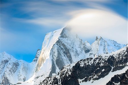 dorsale - View of peak Badile covered with snow in spring Maloja canton of Graubunden Engadin Bregaglia Valley Switzerland Europe Photographie de stock - Rights-Managed, Code: 879-09100845