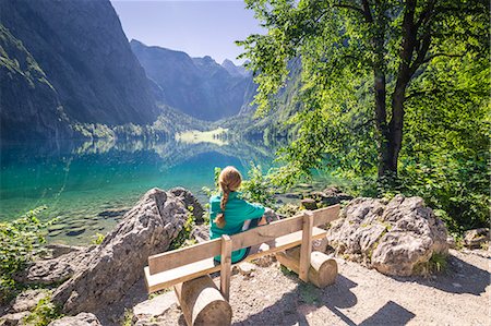 simsearch:879-09100966,k - A girl looking at Lake Obersee, Berchtesgaden Land, Bayern, Germany. Fotografie stock - Rights-Managed, Codice: 879-09100958