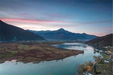scenic and lake - Dascio at sunrise, Nature Reserve of Pian di Spagna, Sorico, Chiavenna Valley, province of Como, Valtellina, Lombardy, Italy Stock Photo - Rights-Managed, Code: 879-09129254