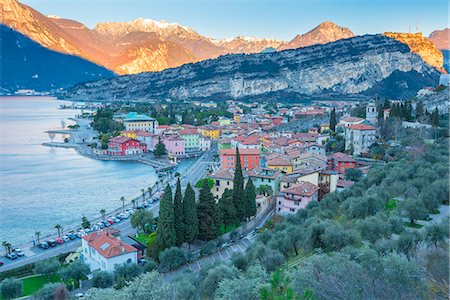 road mountains - Torbole on Garda lake at sunrise Europe, Italy, Trentino, Torbole, Garda lake Stock Photo - Rights-Managed, Code: 879-09129301