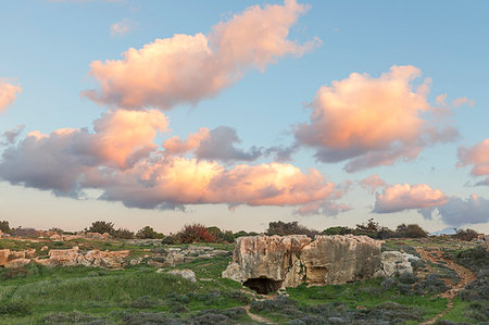 paphos - Cyprus, Paphos, view of the Tombs of the Kings at the sunset Foto de stock - Con derechos protegidos, Código: 879-09188935