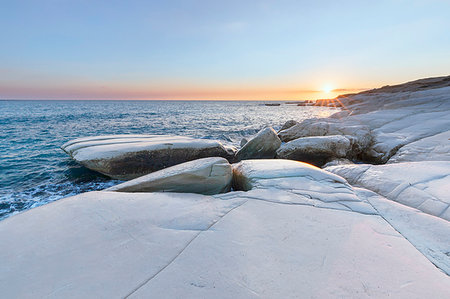 Cyprus, Limassol, The crystal water and the white rocks of Governor's Beach at sunrise Stock Photo - Rights-Managed, Code: 879-09188957