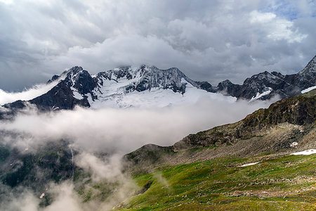 Clouds around Mount Disgrazia, Chiareggio, Valmalenco, Province of Sondrio, Lombardy, Italy Stock Photo - Rights-Managed, Code: 879-09188987