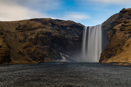 simsearch:879-09043439,k - Skogafoss waterfall in winter day, Sudurland, south Iceland, Iceland, Europe. Stock Photo - Rights-Managed, Code: 879-09189322