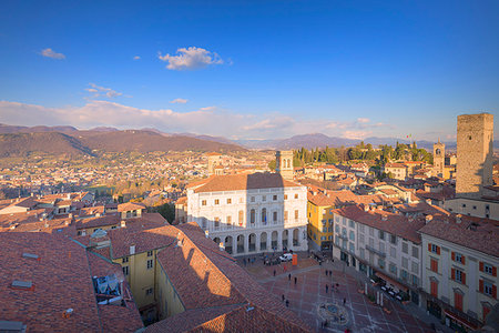 Piazza Vecchia and Palazzo Nuovo (New Palace) from above during sunset. Bergamo, Lombardy, Italy. Stock Photo - Rights-Managed, Code: 879-09189571