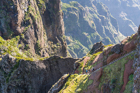 simsearch:879-09190044,k - Three people descenging the steps on the trail from Pico Ruivo to Pico do Areeiro. Funchal, Madeira region, Portugal. Stock Photo - Rights-Managed, Code: 879-09190088