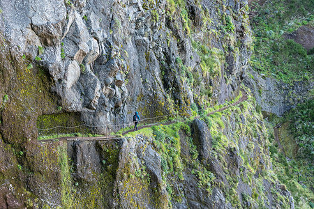 simsearch:879-09190044,k - Woman walking on the trail from Pico Ruivo to Pico do Areeiro. Santana municipality, Madeira region, Portugal. Stock Photo - Rights-Managed, Code: 879-09190083