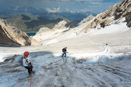 two hikers are walking on the glacier on the Marmolada, Trento province, Trentino Alto Adige, Italy, Photographie de stock - Rights-Managed, Code: 879-09190479