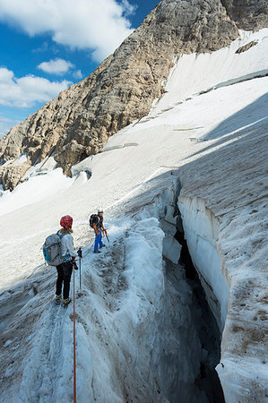 two hikers are walking on the glacier on the Marmolada, Trento province, Trentino Alto Adige, Italy Photographie de stock - Rights-Managed, Code: 879-09190480